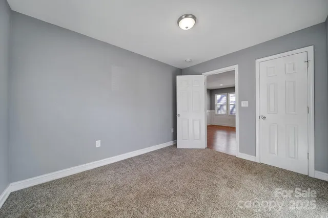 an empty room with a bathroom