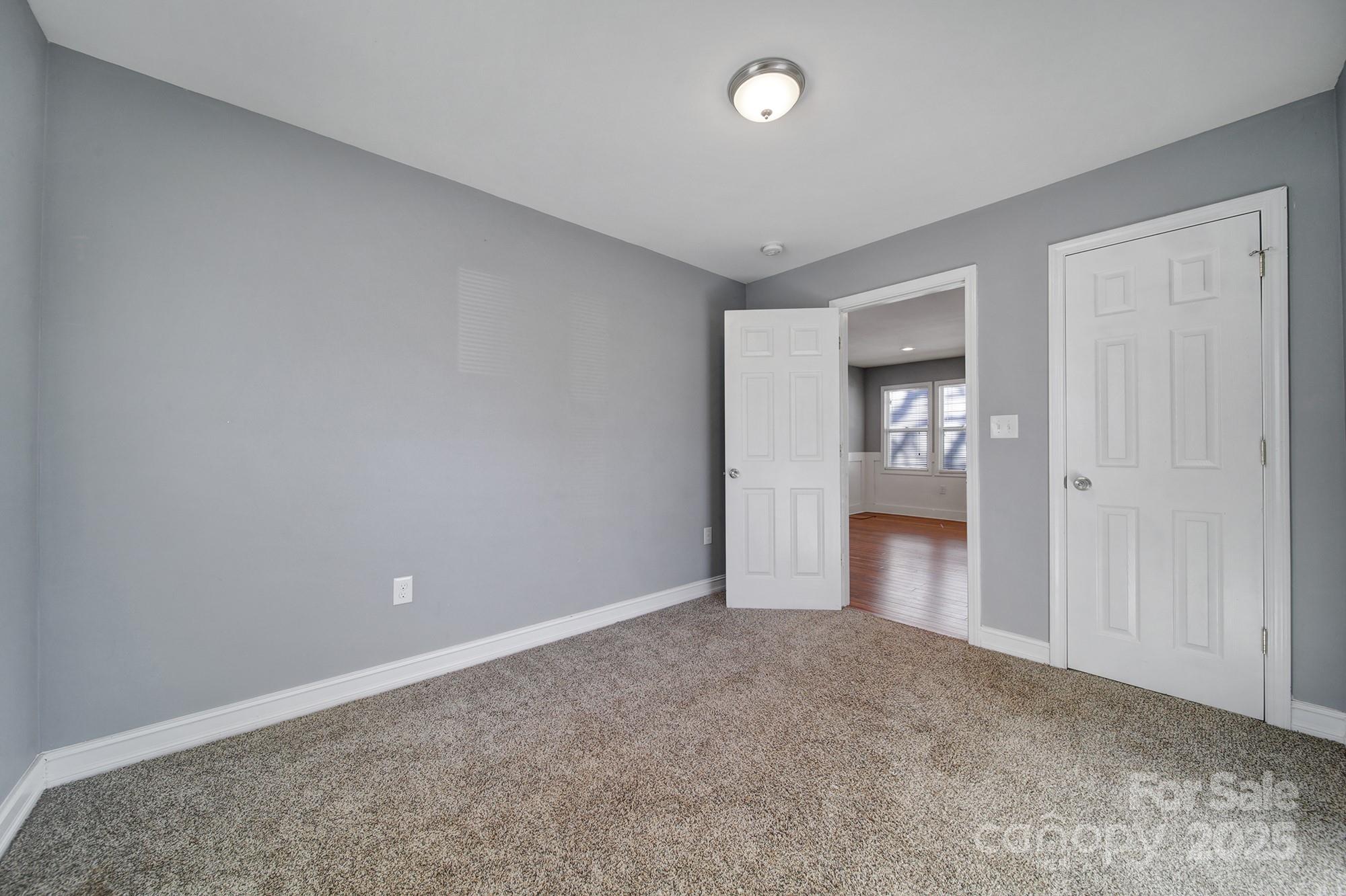 113 West 5th Avenue Gastonia, NC 28052 - Photo 11 of 18 an empty room with a bathroom