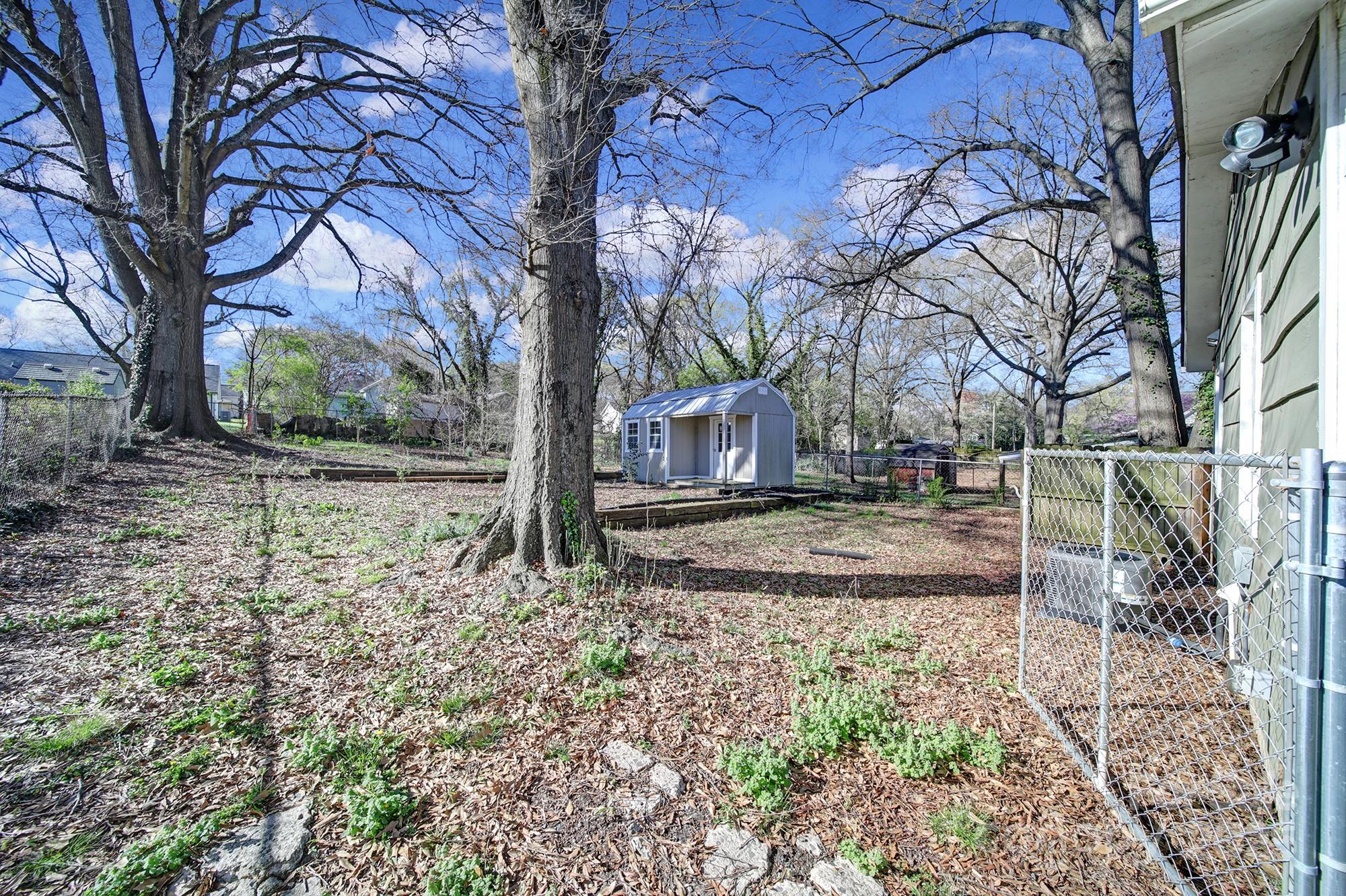 113 West 5th Avenue Gastonia, NC 28052 - Photo 17 of 18 a view of yard with tree in the background