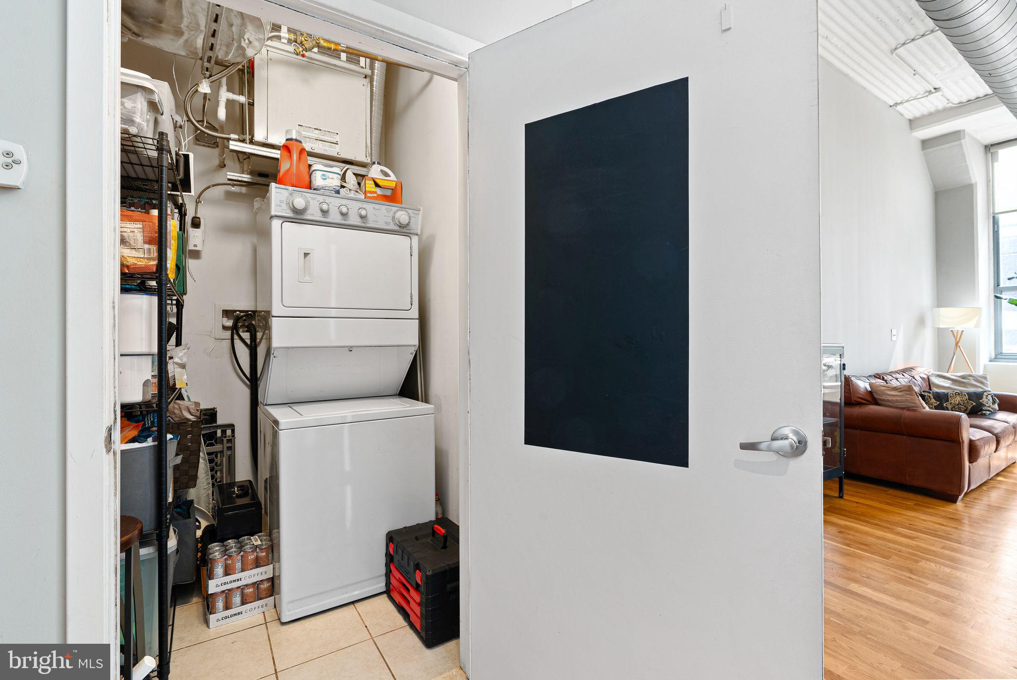 2200-28 Arch Street, Unit 409 Philadelphia, PA 19103 - Photo 13 of 25 a utility room with dryer and washer