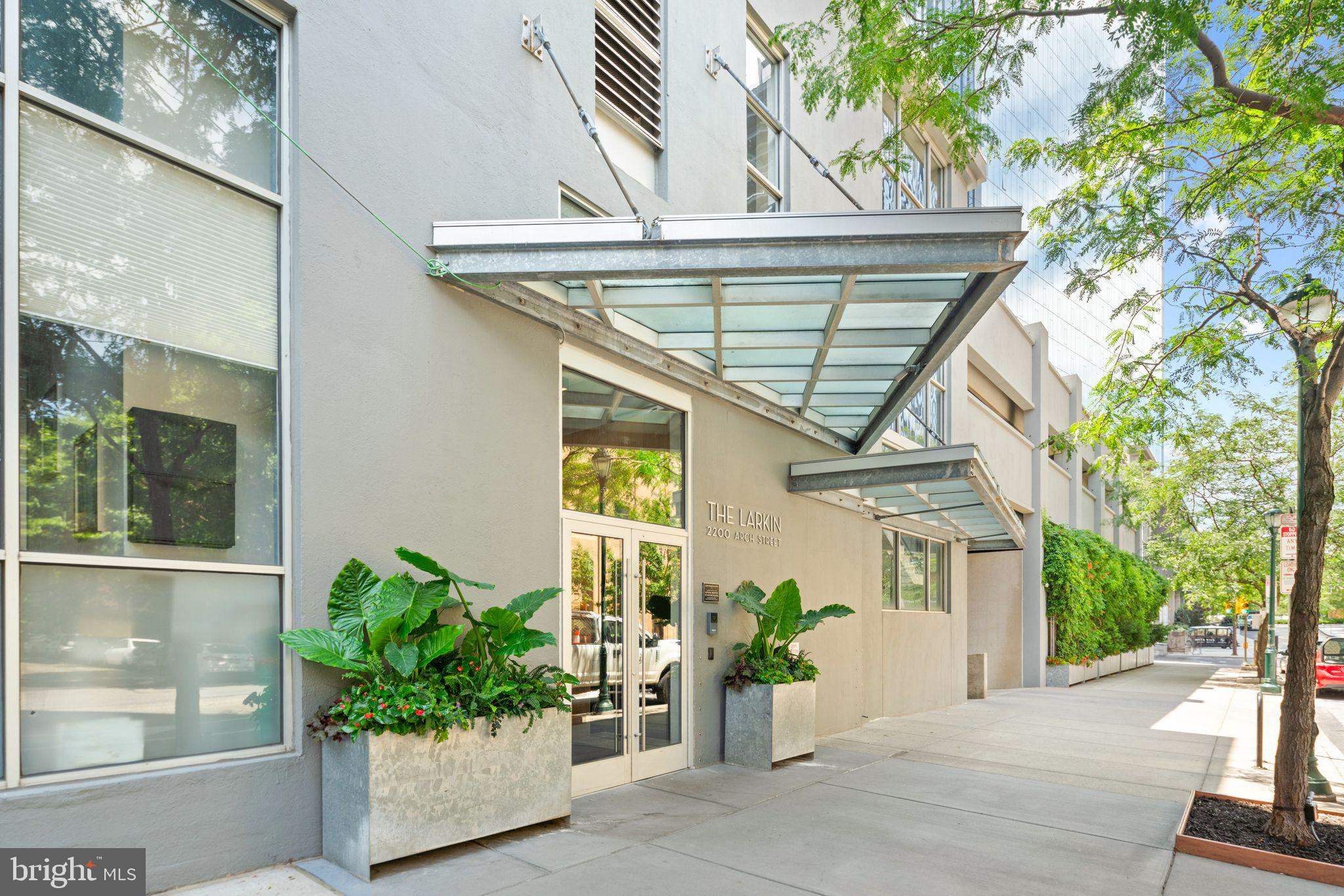 2200-28 Arch Street, Unit 409 Philadelphia, PA 19103 - Photo 17 of 25 a front view of a house with a garden