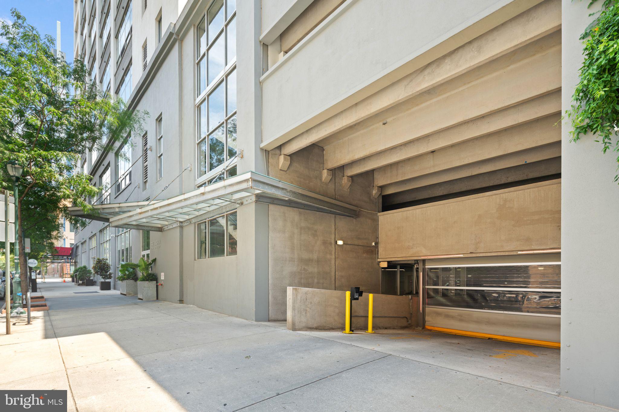 2200-28 Arch Street, Unit 409 Philadelphia, PA 19103 - Photo 18 of 25 a view of a building with car parked on the road