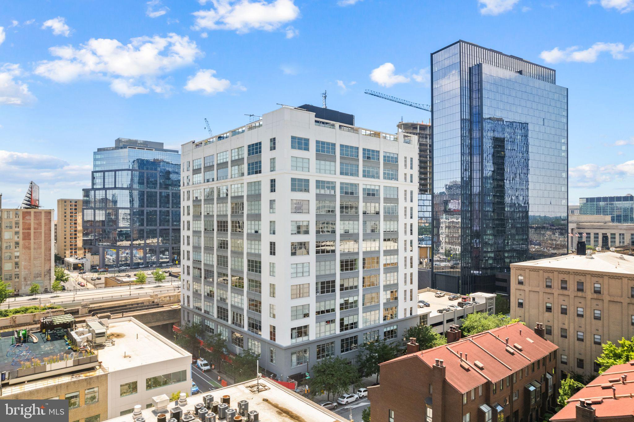 2200-28 Arch Street, Unit 409 Philadelphia, PA 19103 - Photo 22 of 25 a front view of a building with a yard