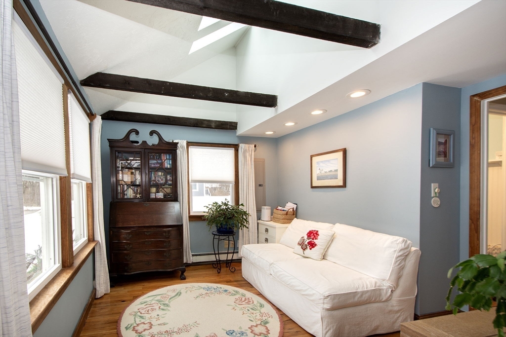 85 Constitution Road Marshfield, MA 02050 - Photo 19 of 36 a living room with furniture and a window