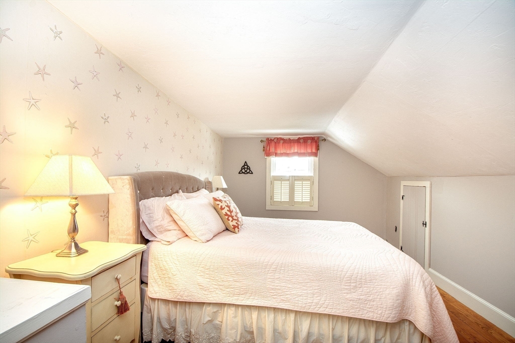 85 Constitution Road Marshfield, MA 02050 - Photo 26 of 36 a bedroom with a bed and a window