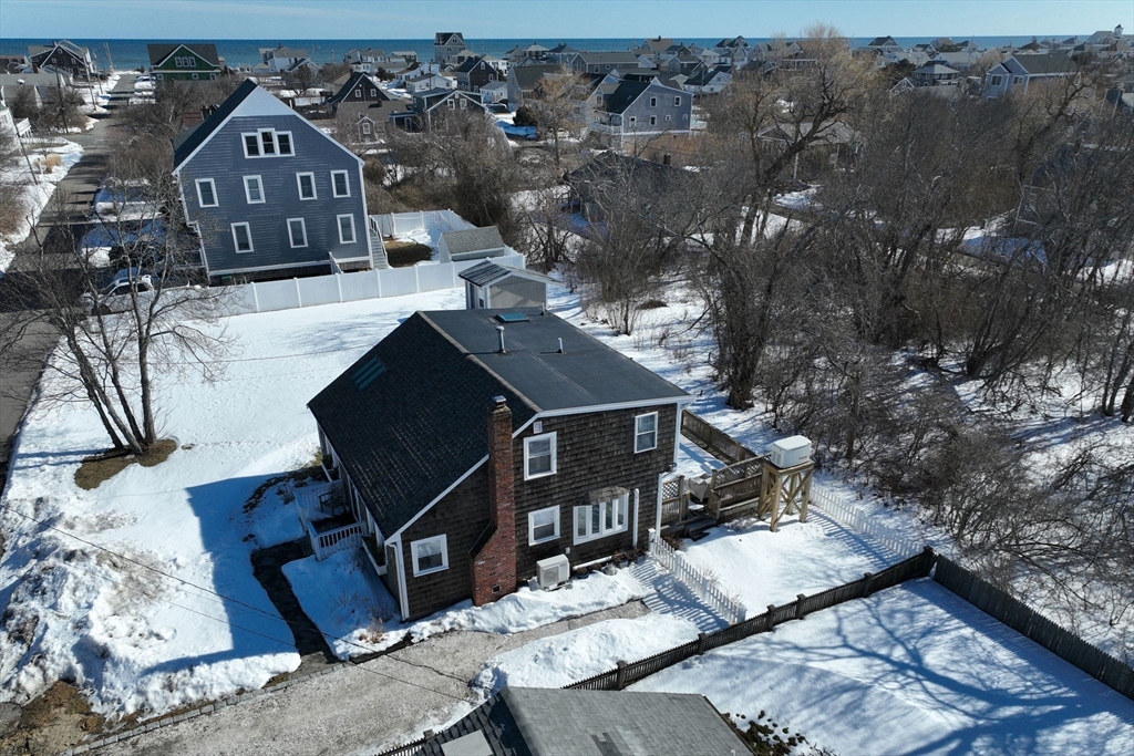 85 Constitution Road Marshfield, MA 02050 - Photo 4 of 36 view of a back yard of the house