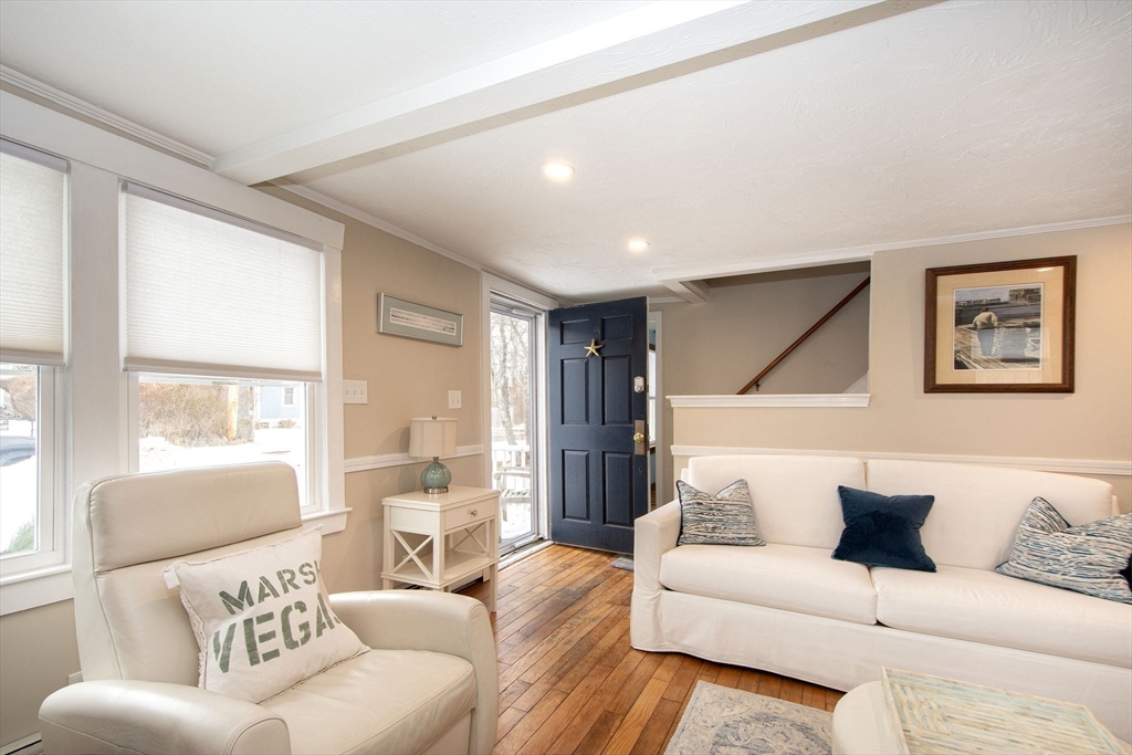 85 Constitution Road Marshfield, MA 02050 - Photo 5 of 36 a living room with furniture and a large window