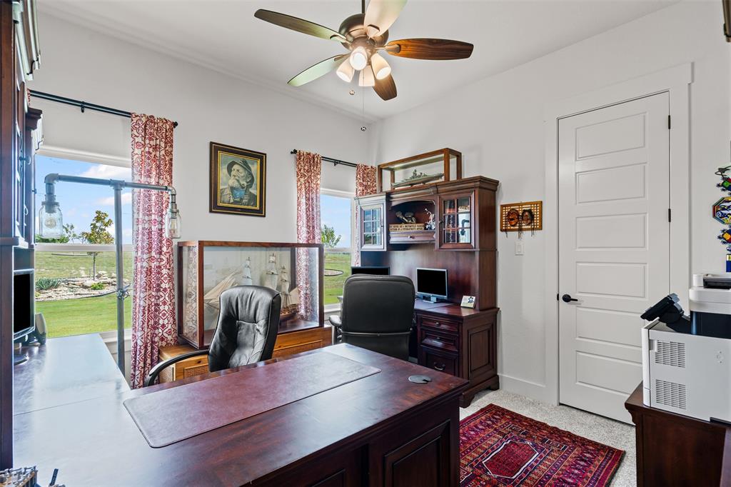 2045 Ellis Ridge Drive Weatherford, TX 76087 - Photo 23 of 40 Home office with ceiling fan and baseboards