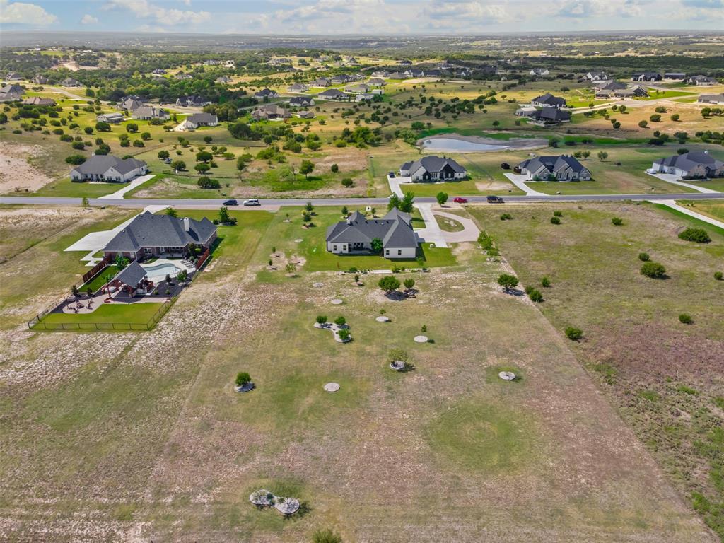 2045 Ellis Ridge Drive Weatherford, TX 76087 - Photo 36 of 40 Aerial view of property and surrounding area featuring nearby suburban area