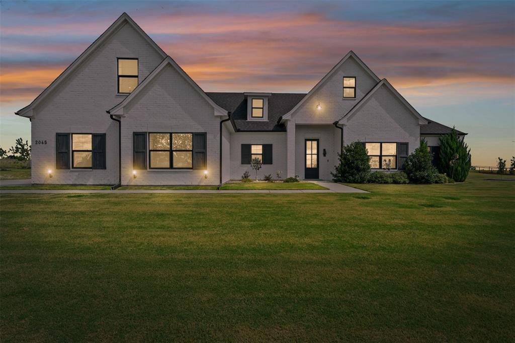 2045 Ellis Ridge Drive Weatherford, TX 76087 - Photo 37 of 40 Modern farmhouse style home featuring a front yard and brick siding