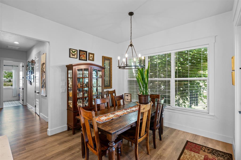 2045 Ellis Ridge Drive Weatherford, TX 76087 - Photo 10 of 40 Dining room featuring a chandelier