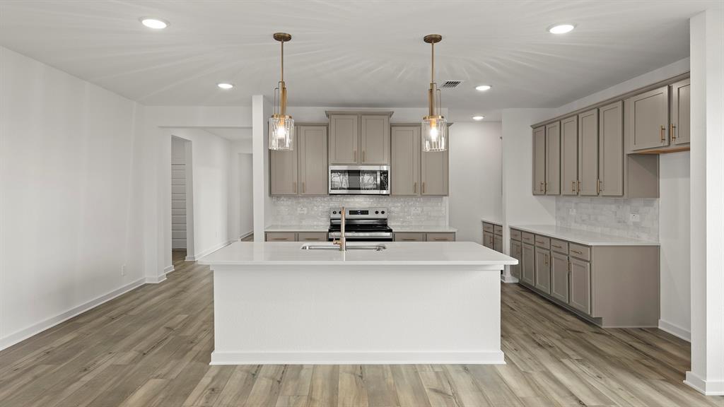 2307 Ryehill Road Forney, TX 75126 - Photo 6 of 25 Olive Kitchen 2