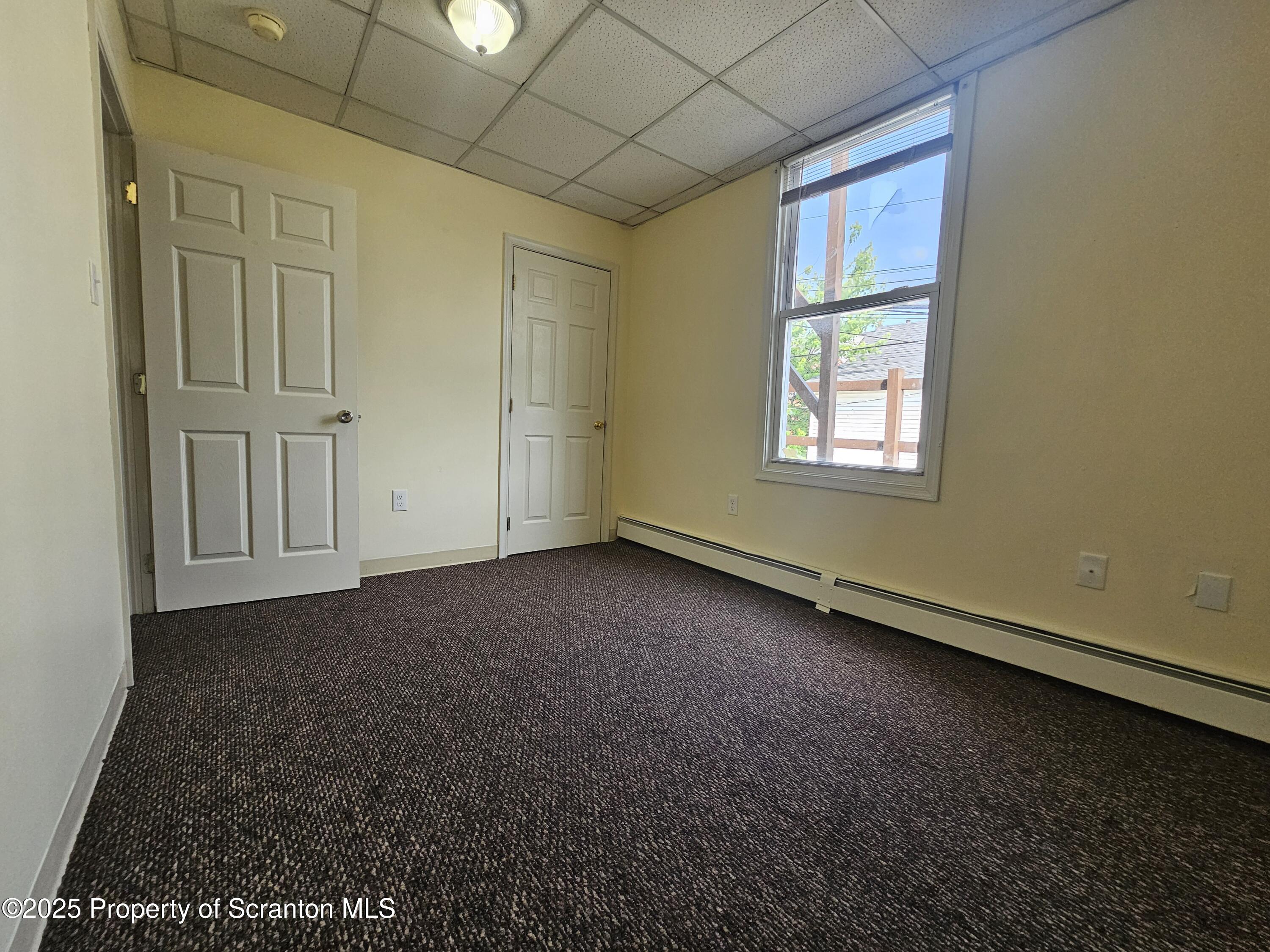 1207 Mulberry Street Scranton, PA 18510 - Photo 11 of 21 an empty room with windows