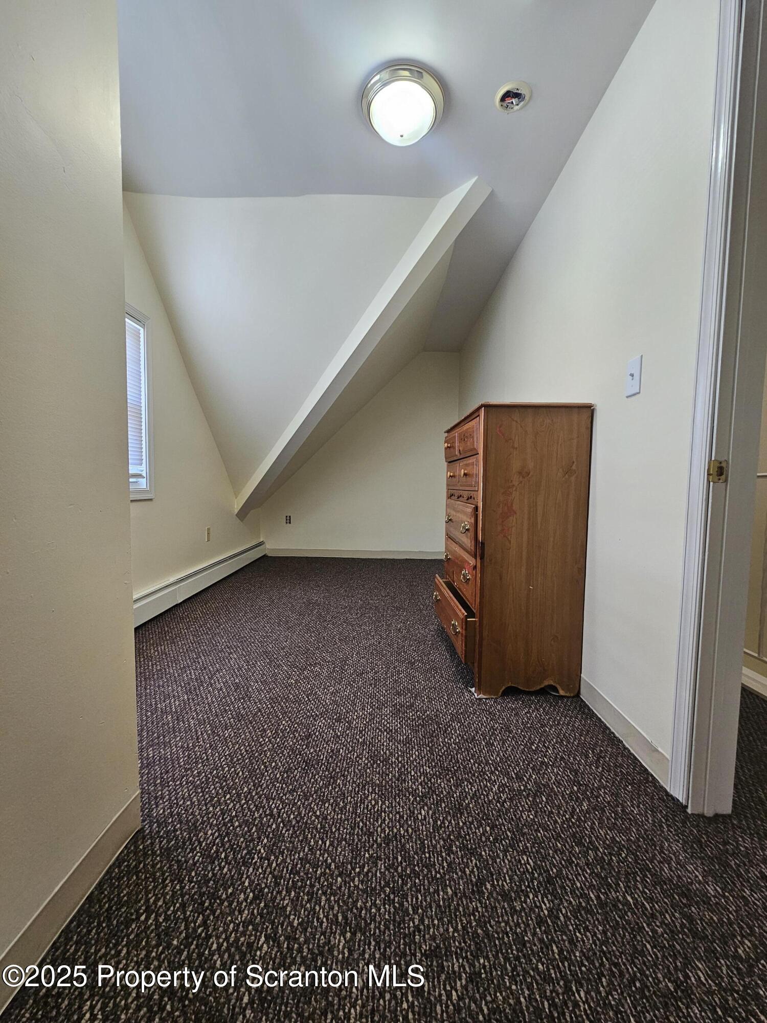 1207 Mulberry Street Scranton, PA 18510 - Photo 18 of 21 a view of an empty room with windows