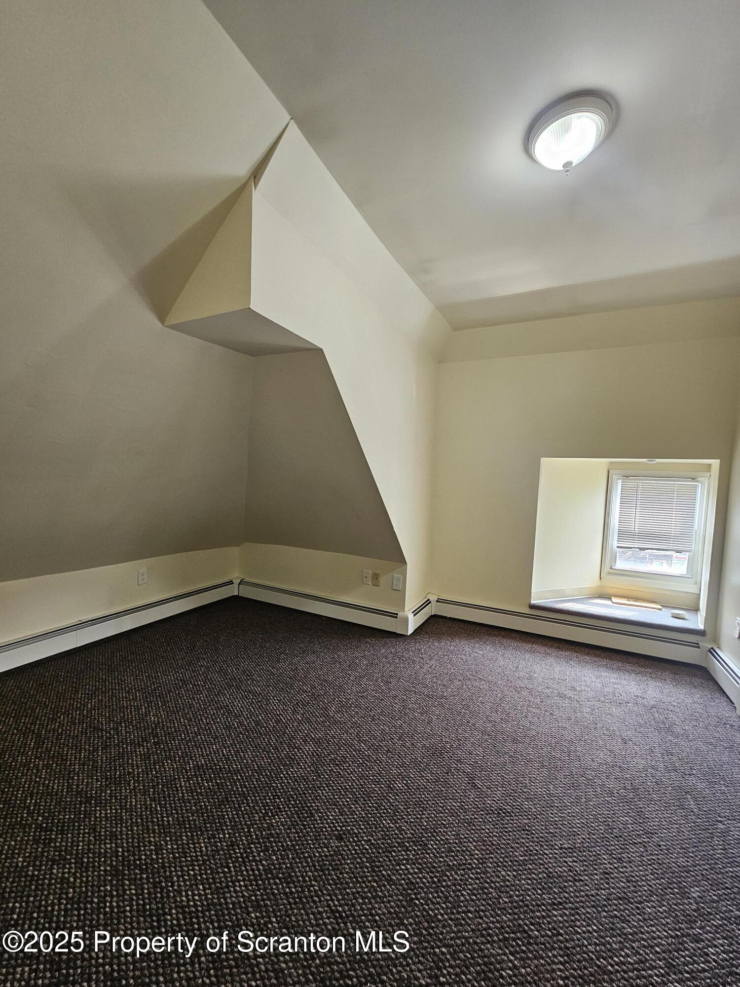 1207 Mulberry Street Scranton, PA 18510 - Photo 20 of 21 a view of an empty room with a window