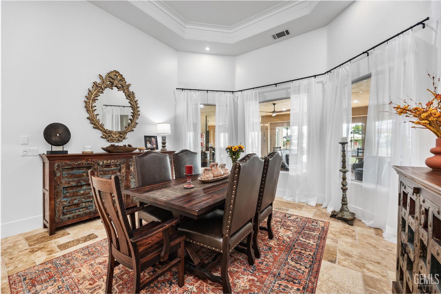 Undisclosed Address Bakersfield, CA 93314 - Photo 11 of 59 a view of a dining room with furniture