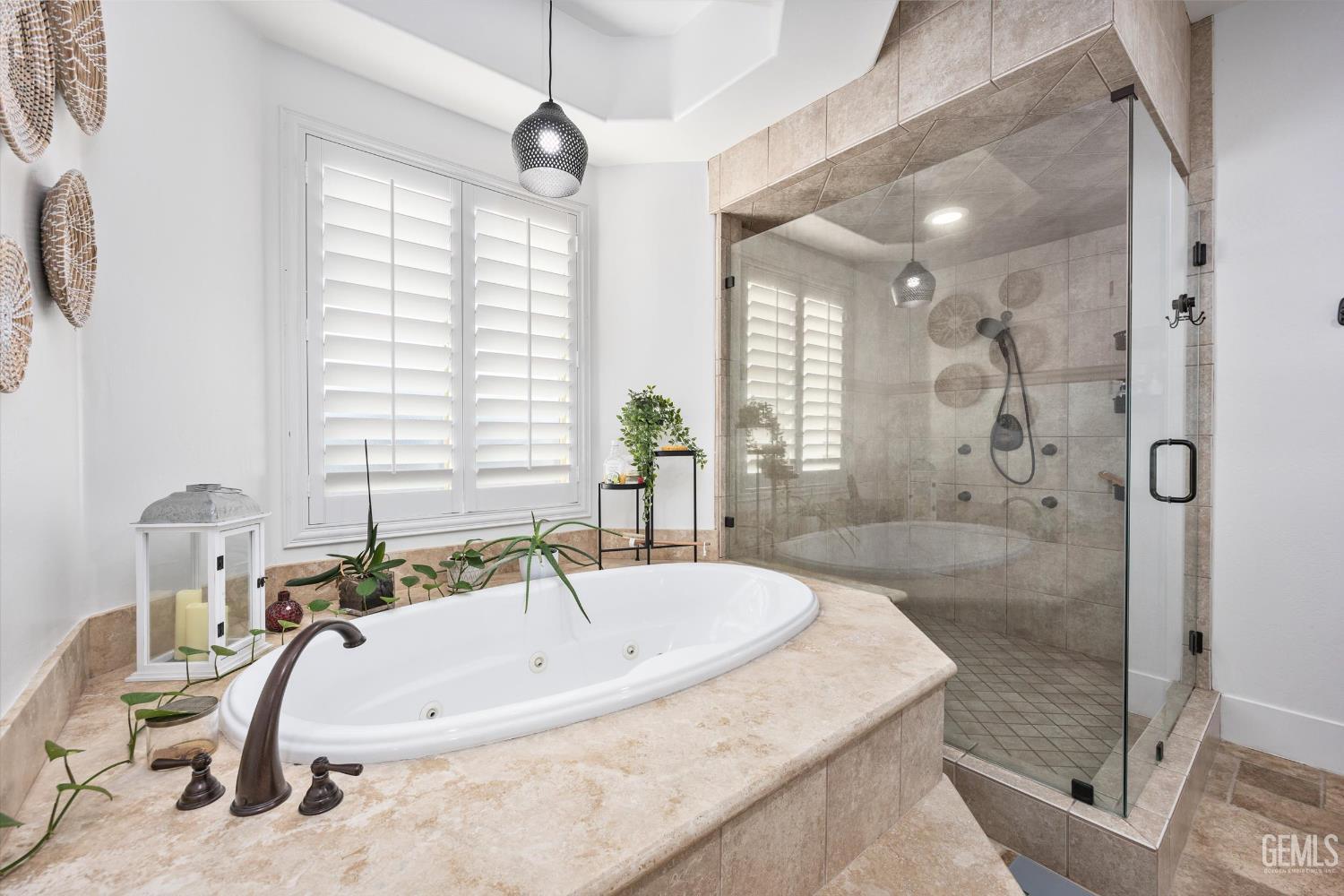 Undisclosed Address Bakersfield, CA 93314 - Photo 25 of 59 a white bath tub sitting in a bathroom next to a window