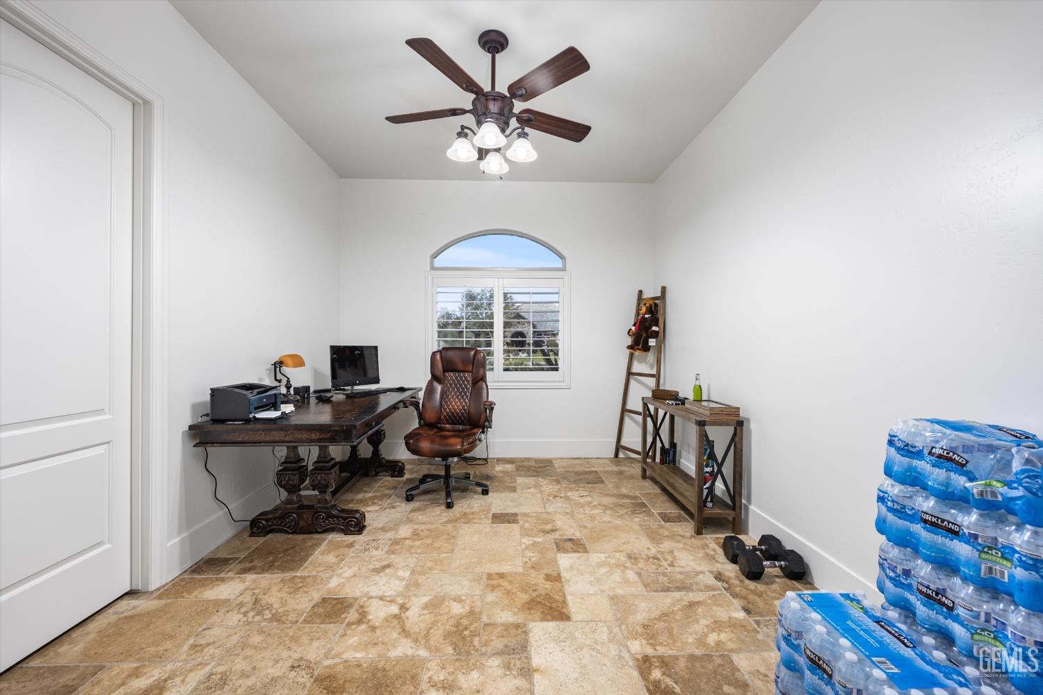 Undisclosed Address Bakersfield, CA 93314 - Photo 26 of 59 a view of a workspace with furniture and a window