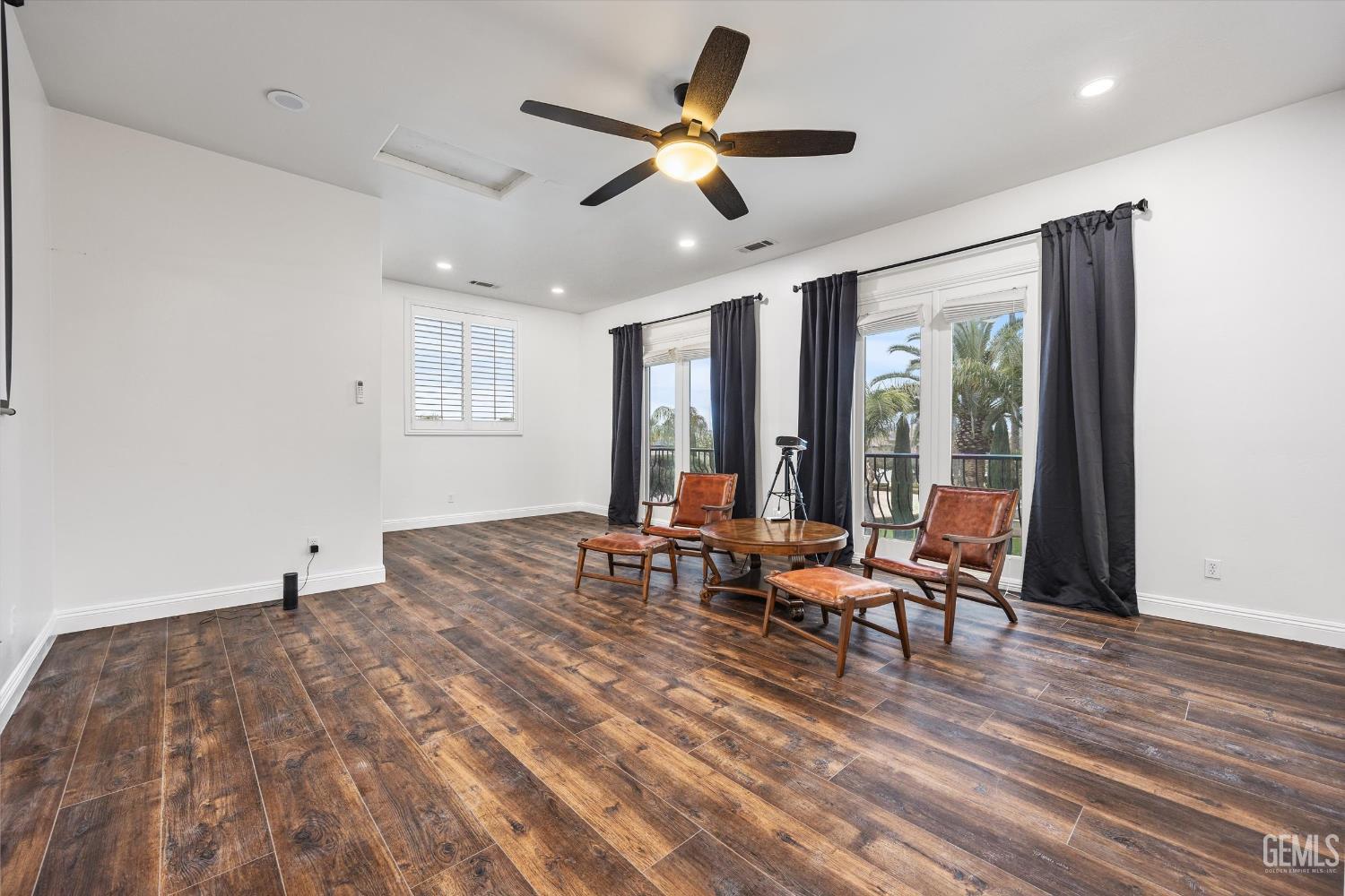 Undisclosed Address Bakersfield, CA 93314 - Photo 34 of 59 a living room with furniture and large windows