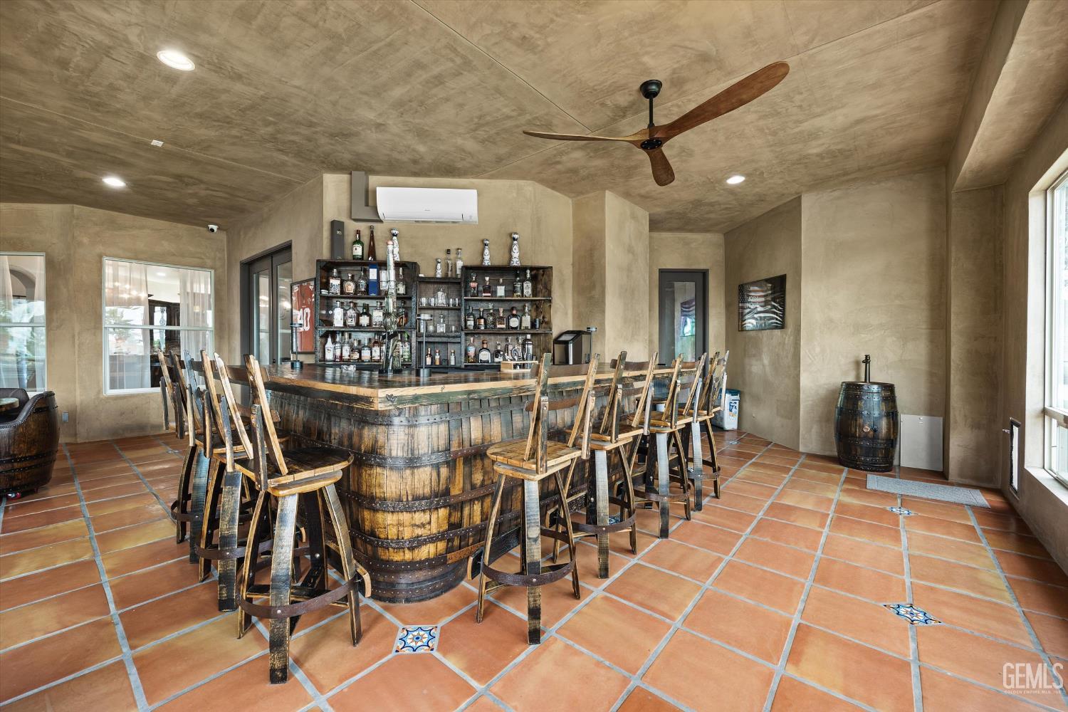 Undisclosed Address Bakersfield, CA 93314 - Photo 39 of 59 a dining room with stainless steel appliances kitchen island granite countertop a table and chairs