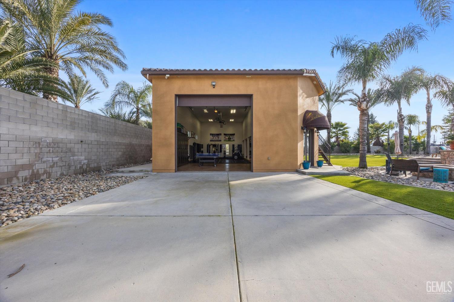 Undisclosed Address Bakersfield, CA 93314 - Photo 40 of 59 a view of a house with basketball court