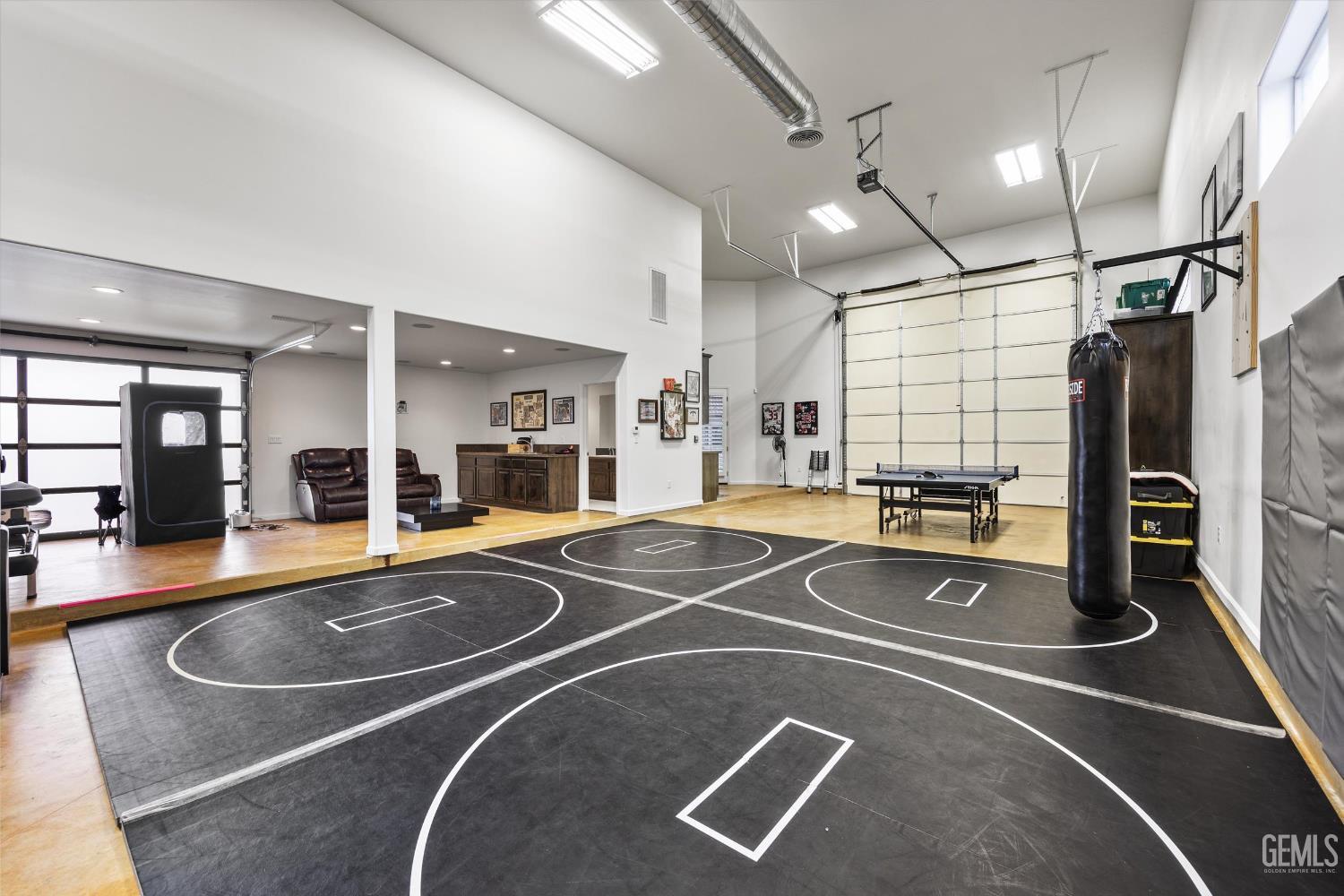 Undisclosed Address Bakersfield, CA 93314 - Photo 42 of 59 a view of a room with gym equipment