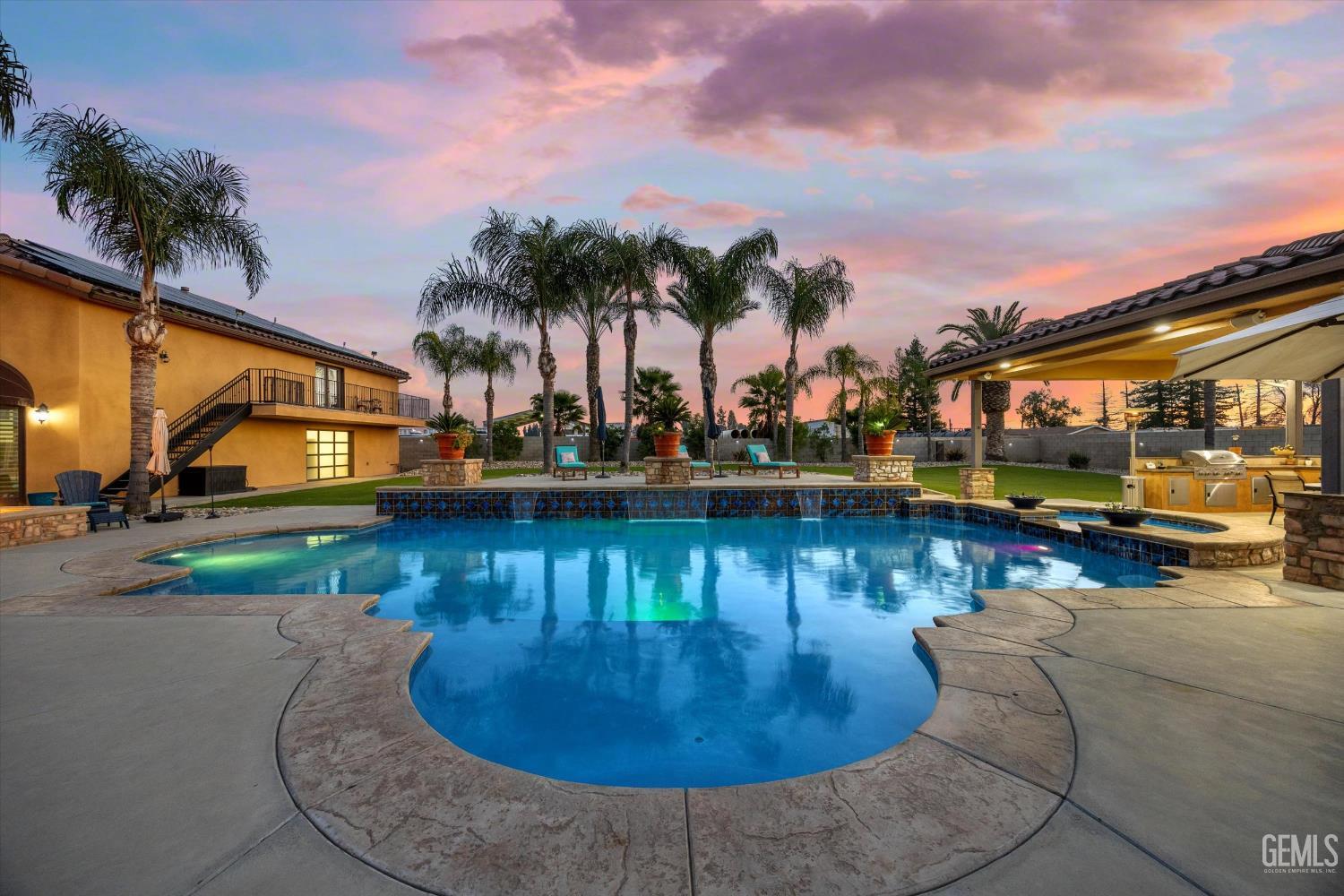 Undisclosed Address Bakersfield, CA 93314 - Photo 54 of 59 a view of a swimming pool with a patio