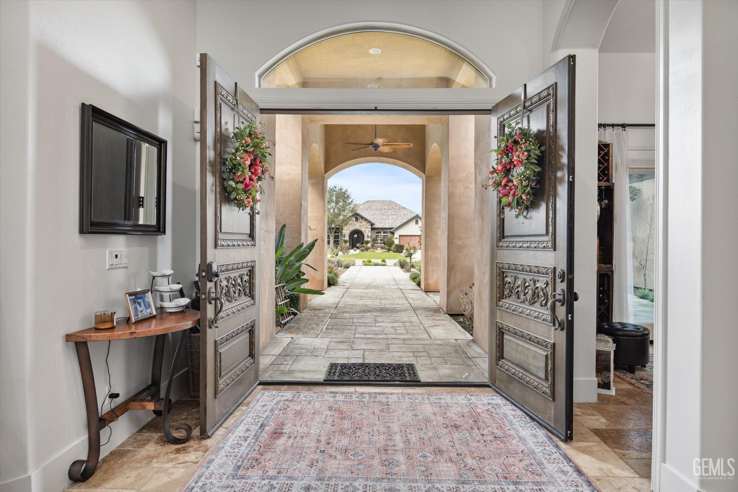 Undisclosed Address Bakersfield, CA 93314 - Photo 9 of 59 a living room with furniture and a fireplace