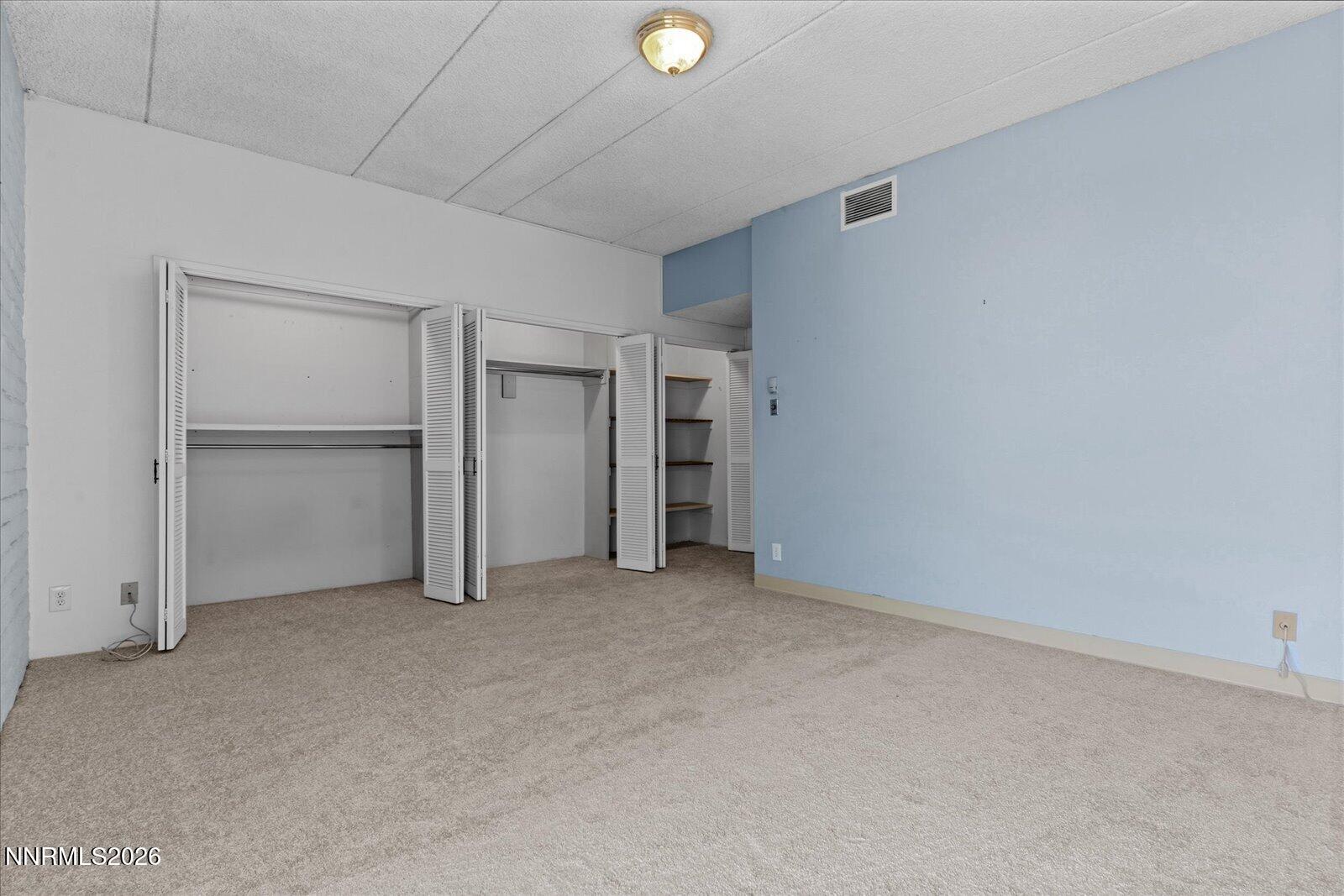 1200 Riverside Drive, Unit 1229 Reno, NV 89503 - Photo 42 of 51 a view of an empty room with a kitchen
