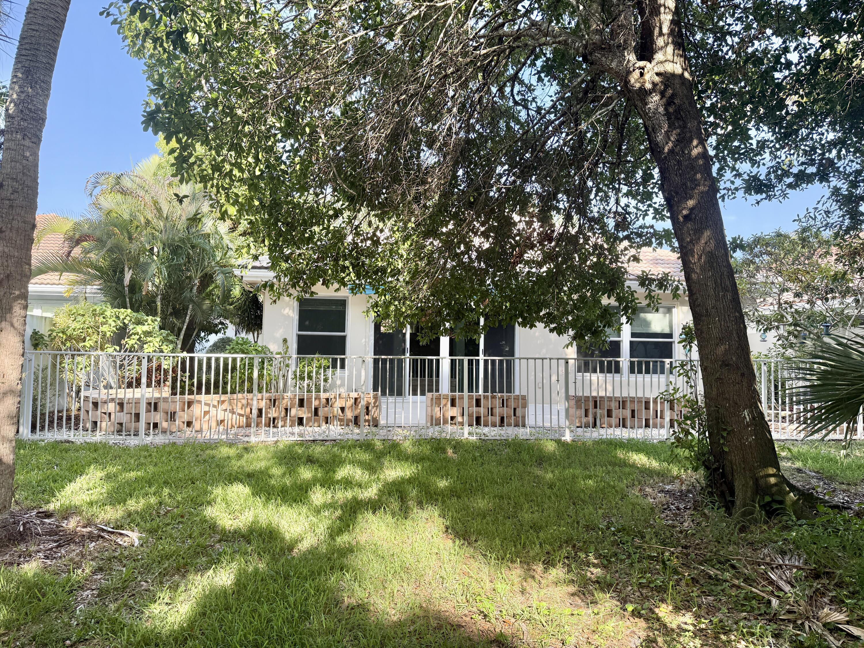 198 Hampton Circle Jupiter, FL 33458 - Photo 4 of 19 rear View from Preserve
