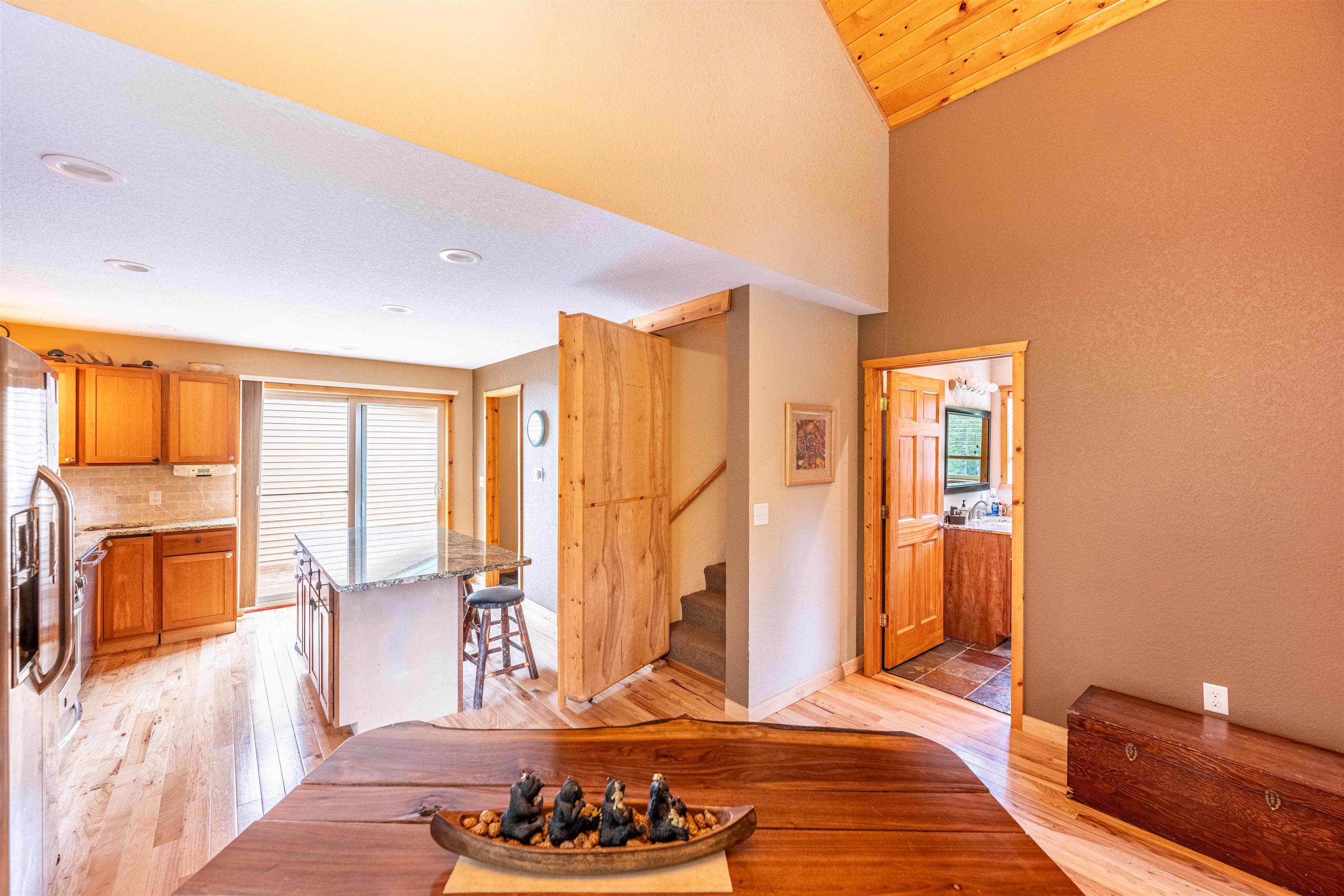 54755 Silverwolf Drive Barnes, WI 54873 - Photo 7 of 18 Sunlit dining area overlooking wooded surroundings