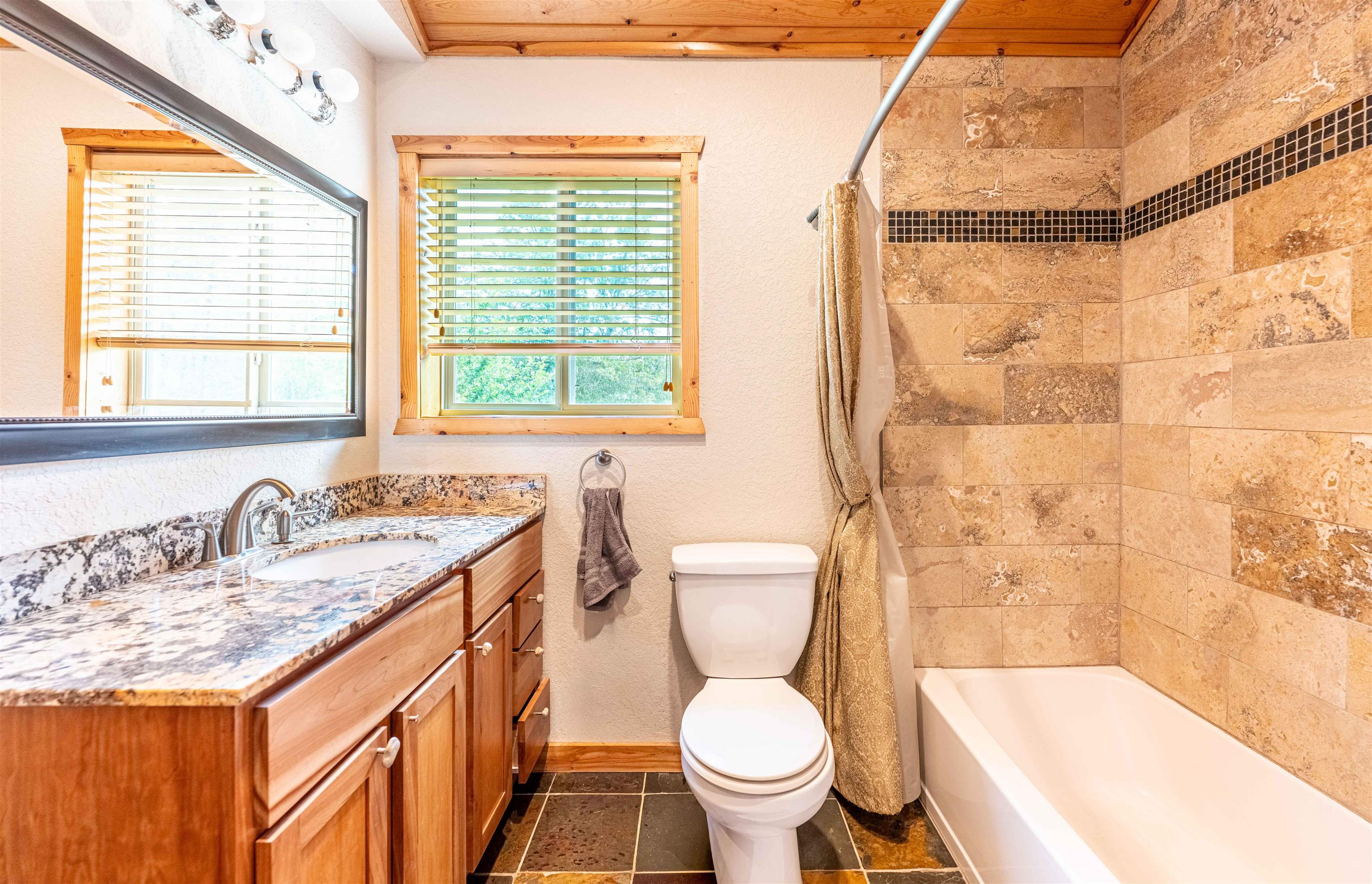 54755 Silverwolf Drive Barnes, WI 54873 - Photo 9 of 18 Spa-inspired bath with tile surround