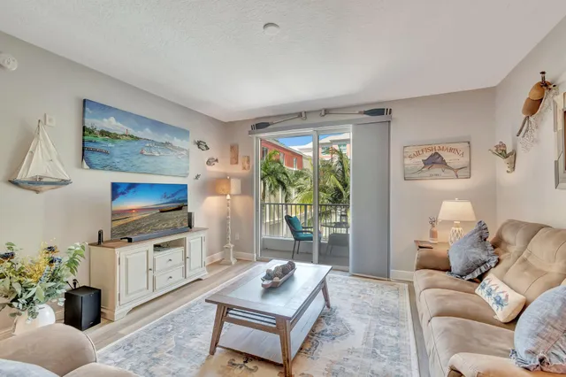 a bedroom with a bed and a potted plant