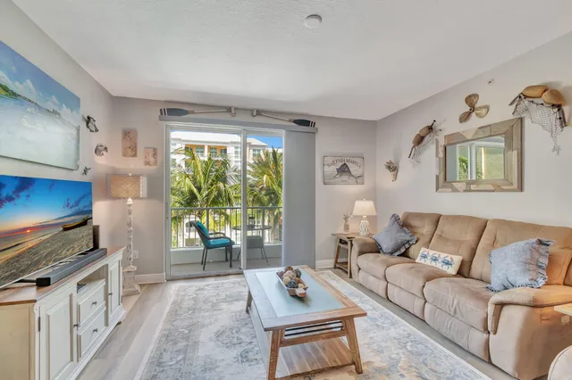 a bedroom with a large bed and a dresser