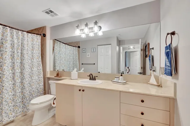 a view of a city with an ocean view