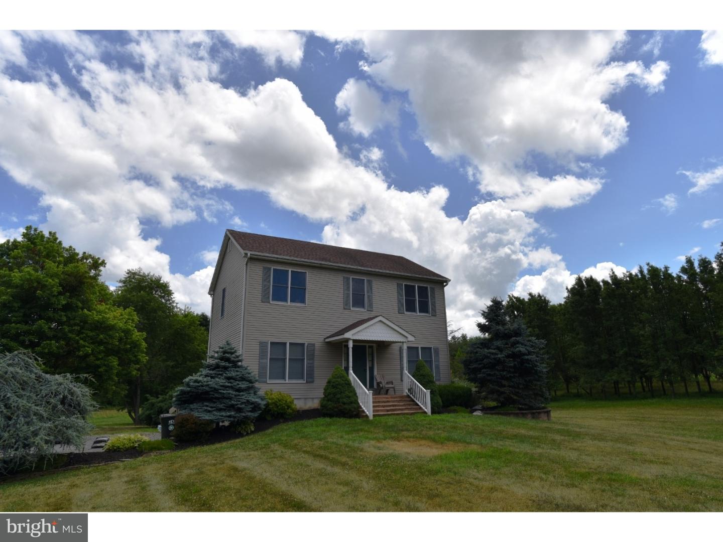 529 Province Line Road Allentown, NJ 08501 - Photo 1 of 21 a view of a house with yard and a garden