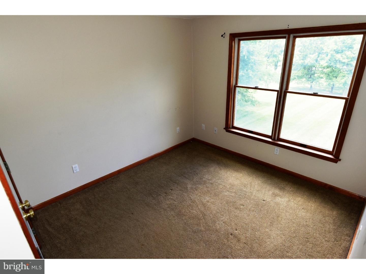 529 Province Line Road Allentown, NJ 08501 - Photo 15 of 21 an empty room with a window