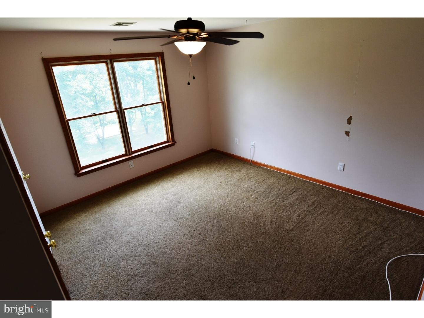 529 Province Line Road Allentown, NJ 08501 - Photo 16 of 21 an empty room with windows