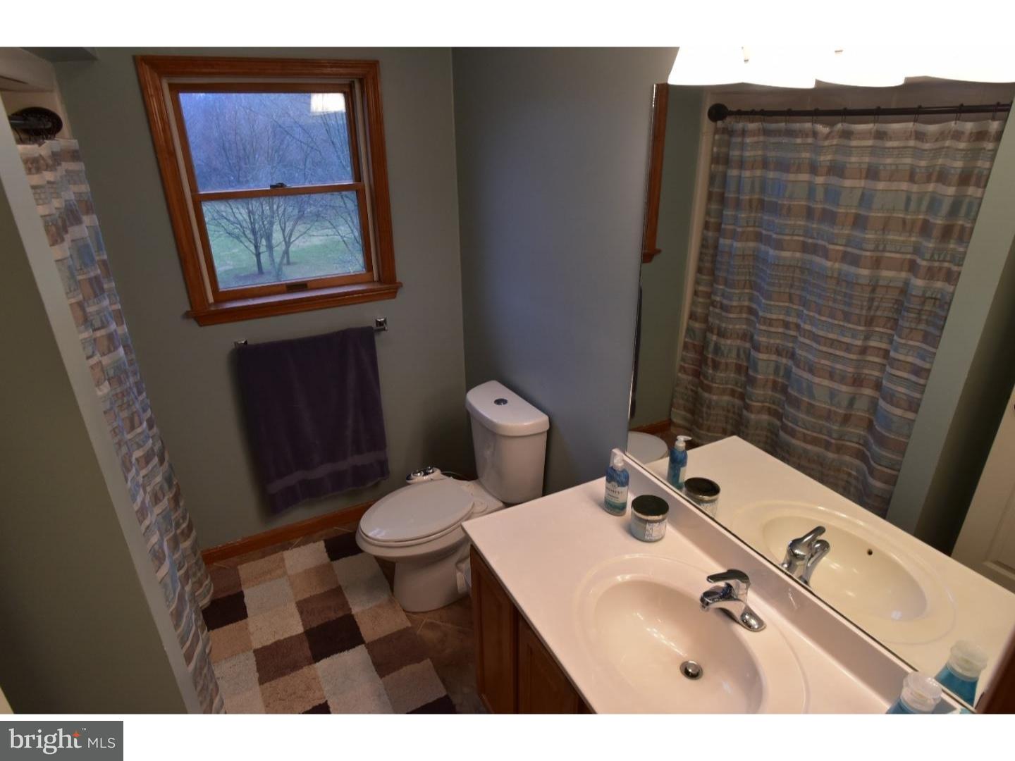 529 Province Line Road Allentown, NJ 08501 - Photo 17 of 21 a bathroom with a sink toilet and shower