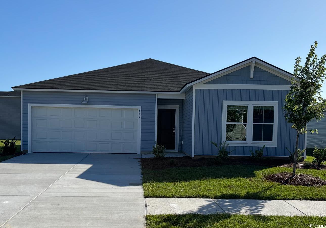 842 Long Bch Loop Longs, SC 29568 - Photo 1 of 32 Single story home featuring a front yard, driveway, and an attached garage