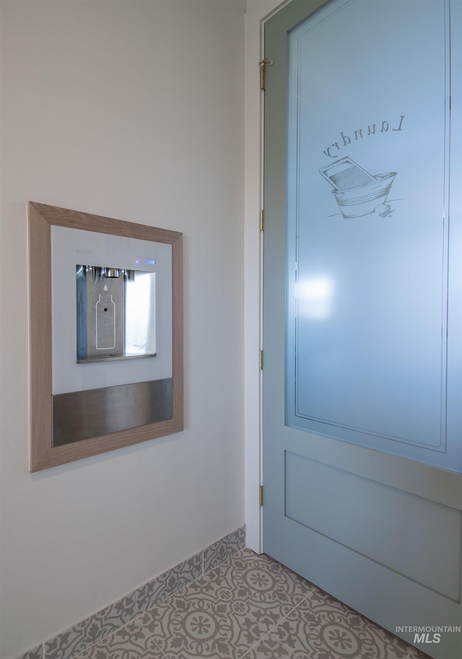 44 Big Moose Road McCall, ID 83638 - Photo 36 of 50 Built-in water dispenser with a light wood-finish frame