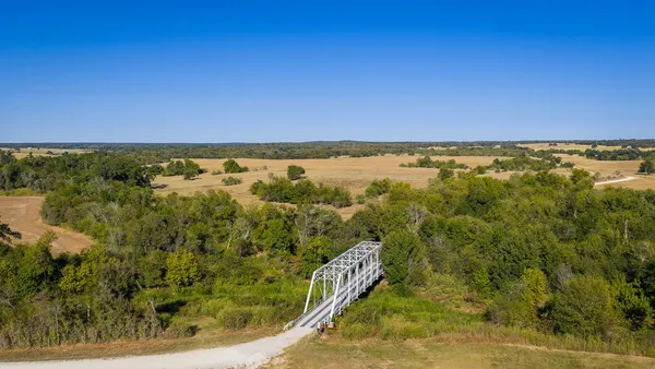 a view of an ocean and a mountain