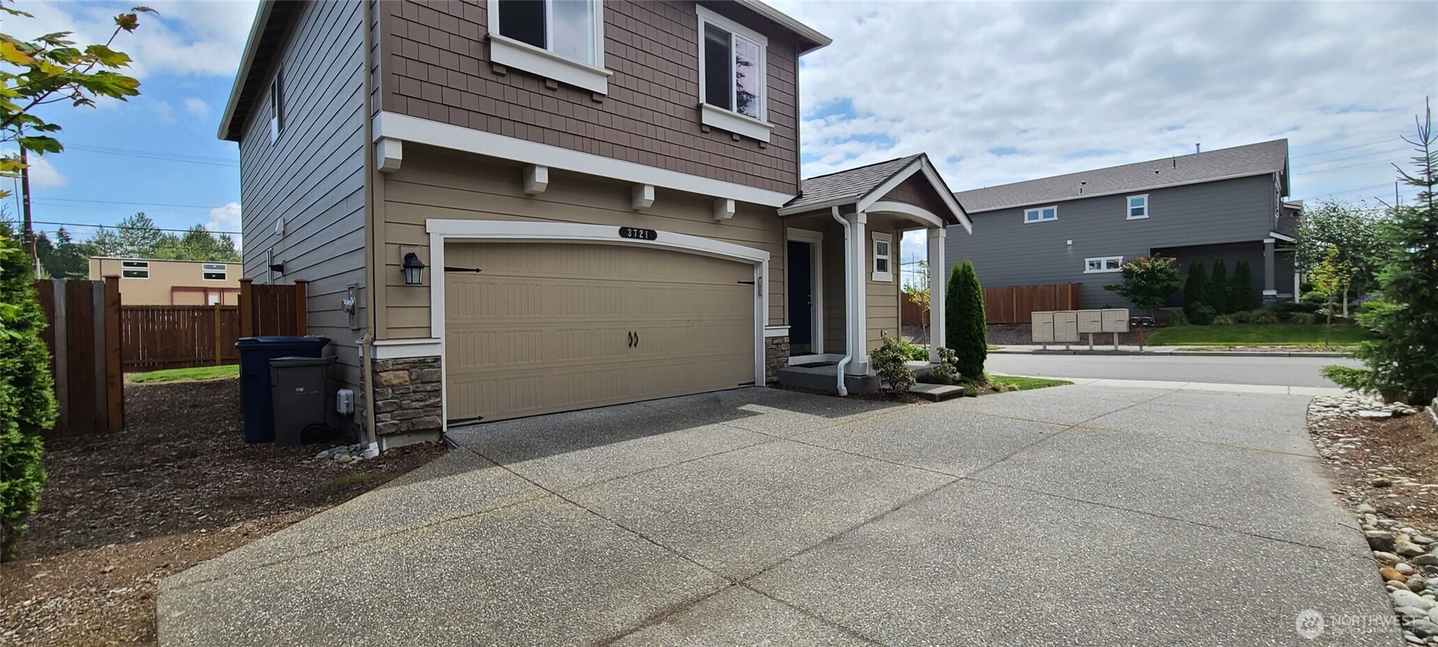 3721 202nd Pl S East Bothell, WA 98012 - Photo 1 of 23 a view of a house with a parking space