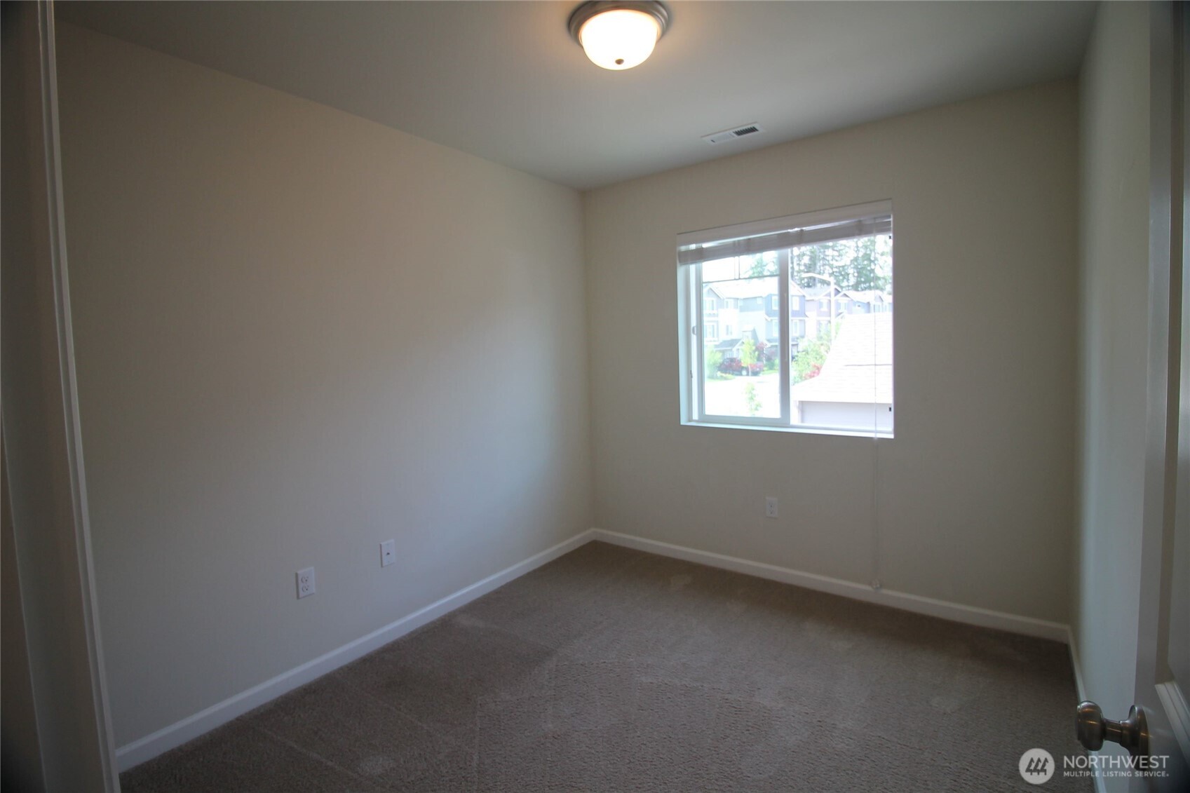 3721 202nd Pl S East Bothell, WA 98012 - Photo 14 of 23 an empty room with a window