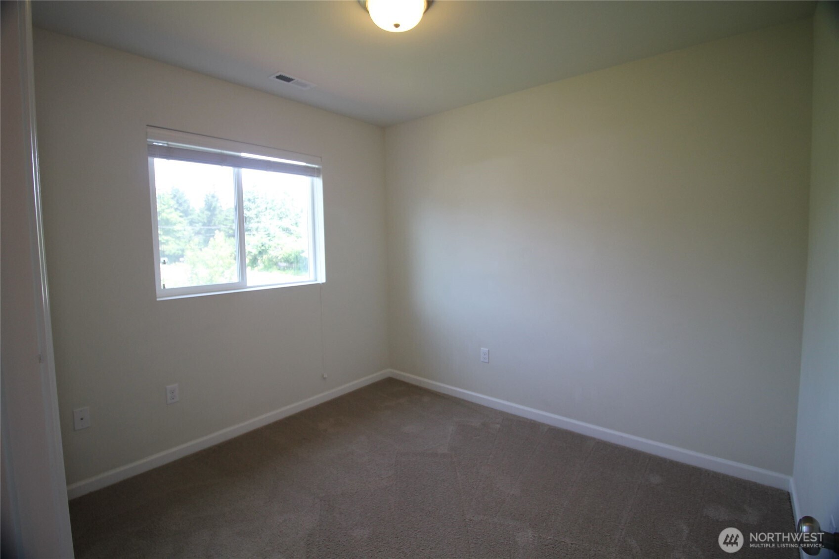 3721 202nd Pl S East Bothell, WA 98012 - Photo 15 of 23 an empty room with a window