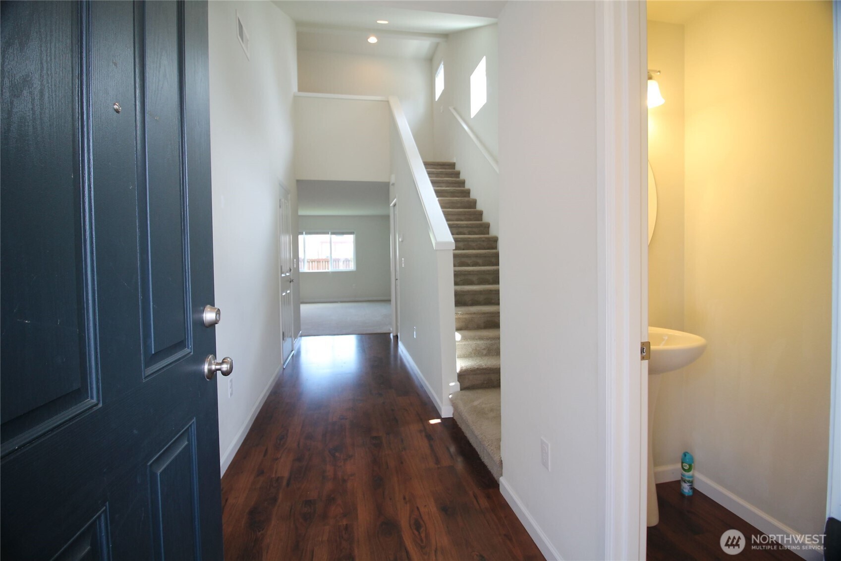 3721 202nd Pl S East Bothell, WA 98012 - Photo 4 of 23 a view of entryway and hall with wooden floor