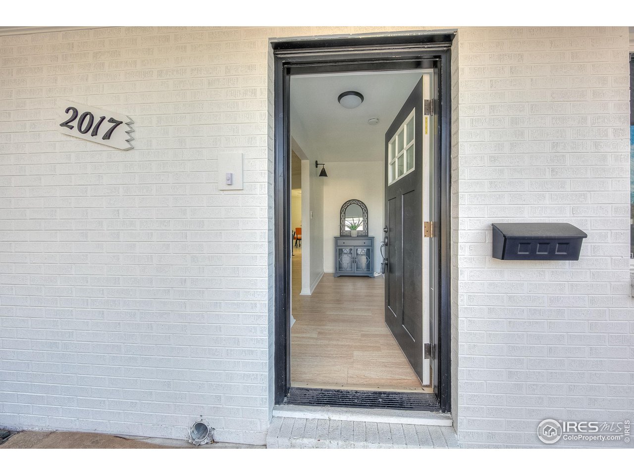 2017 Evergreen Drive Fort Collins, CO 80521 - Photo 2 of 33 a view of a bedroom from a hallway