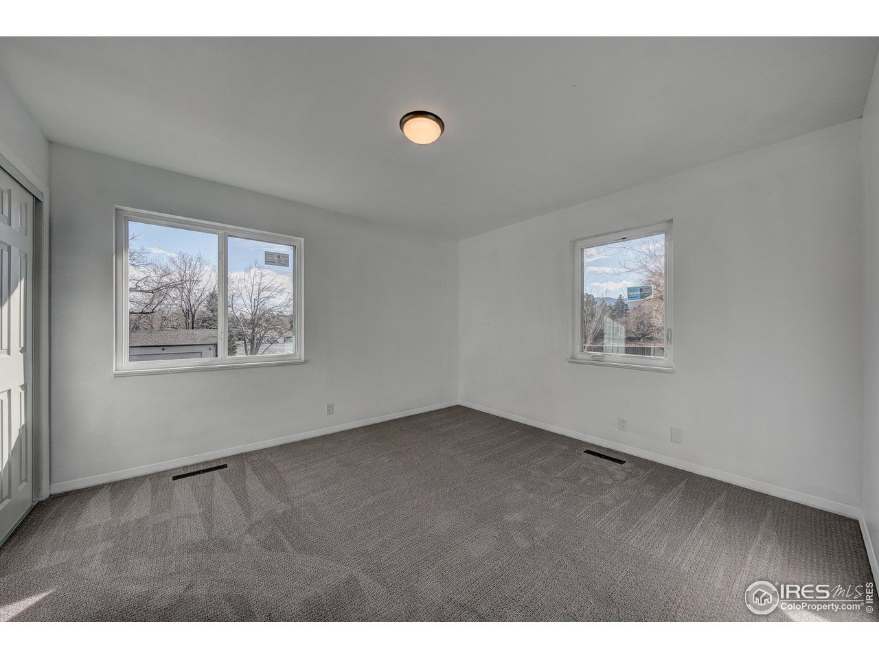 2017 Evergreen Drive Fort Collins, CO 80521 - Photo 23 of 33 a view of an empty room with a window