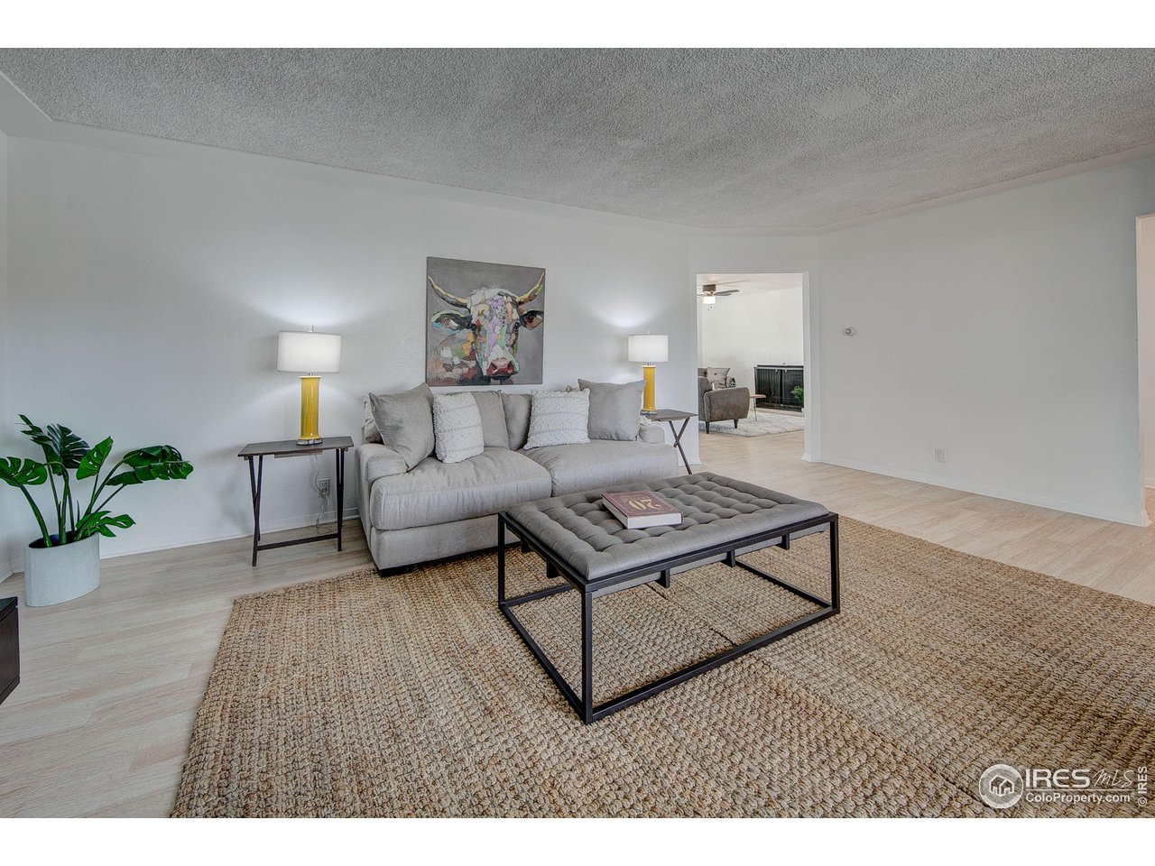 2017 Evergreen Drive Fort Collins, CO 80521 - Photo 3 of 33 a living room with furniture and a wooden floor