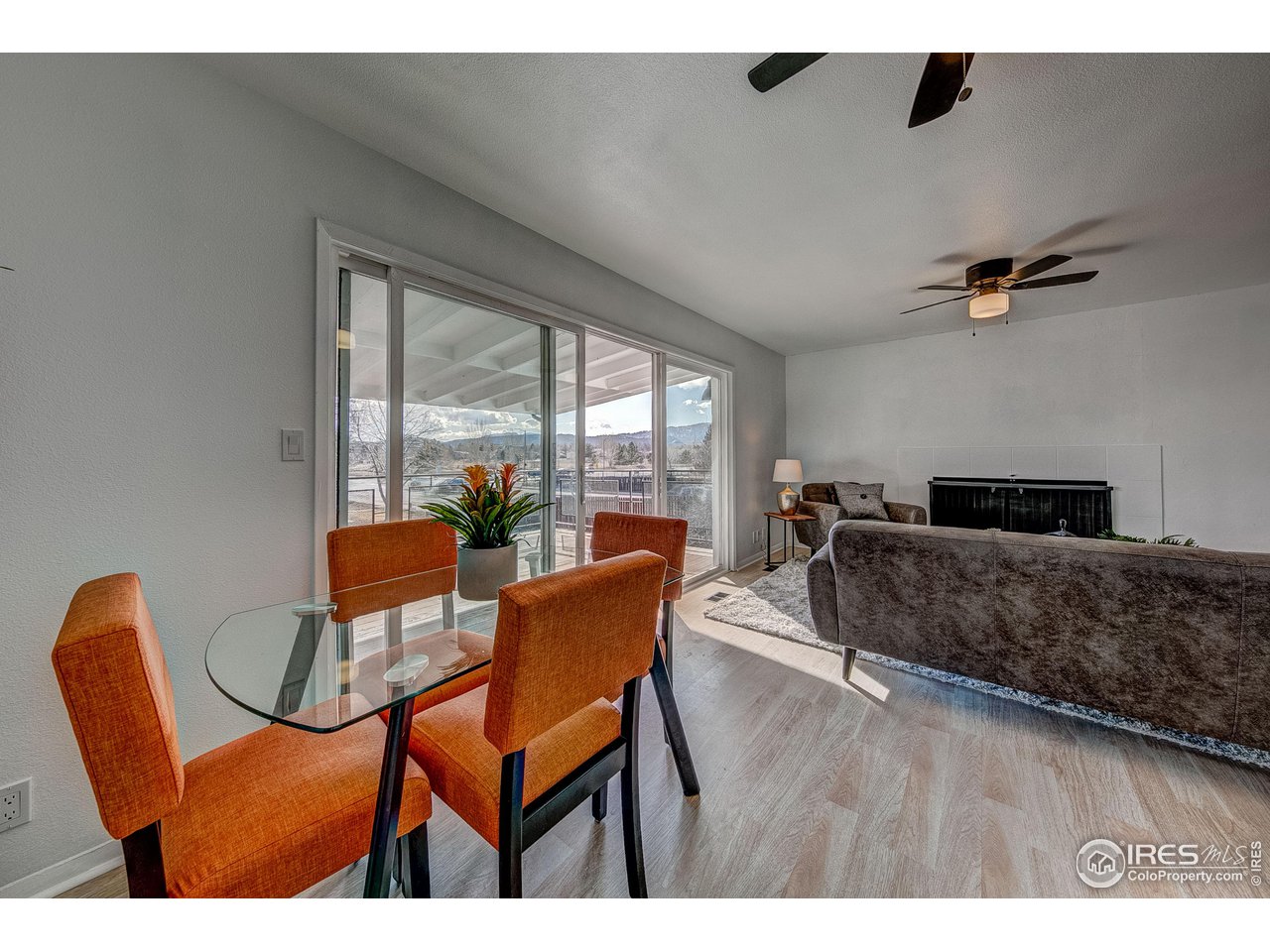 2017 Evergreen Drive Fort Collins, CO 80521 - Photo 9 of 33 a living room with furniture and a floor to ceiling window